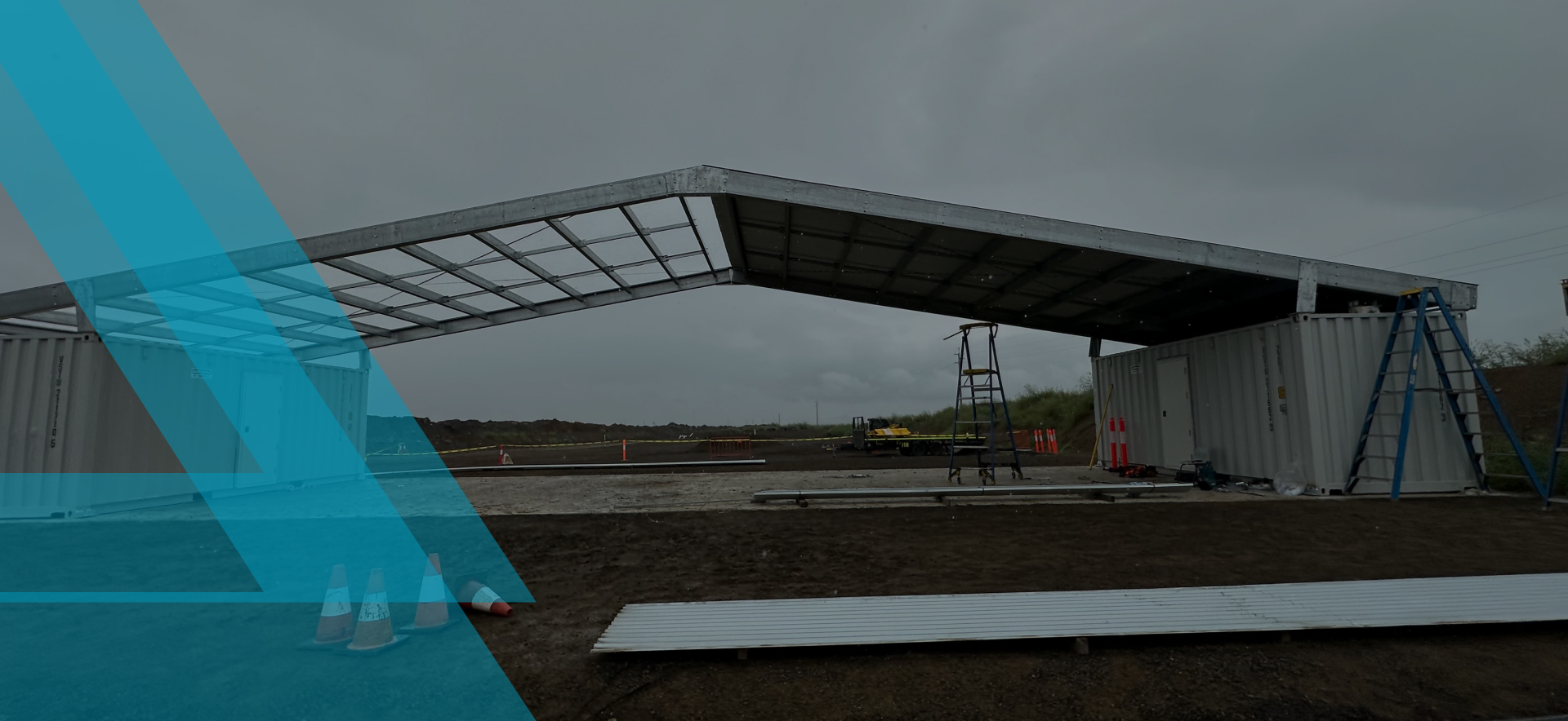 Partially constructed metal structure on a worksite, representing Slamm Services' expertise in industrial construction projects